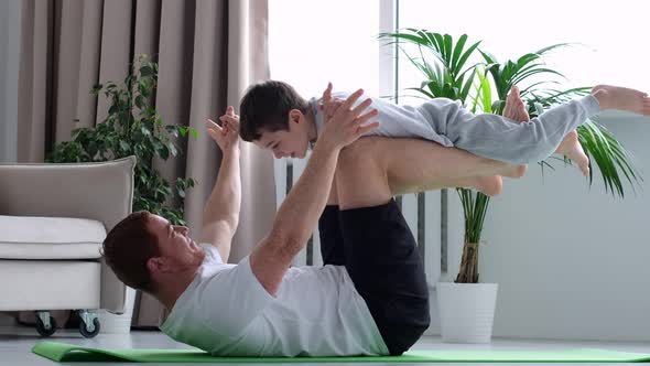 Father Playing with Son at Home alt