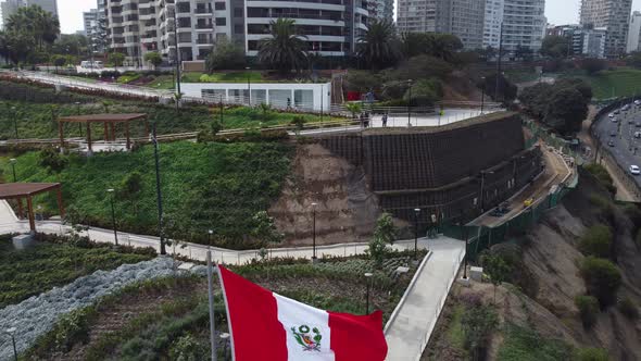 Drone footage of a park in Lima, Peru in Miraflores district. "Parque Bicentenario" Drone flying bac alt