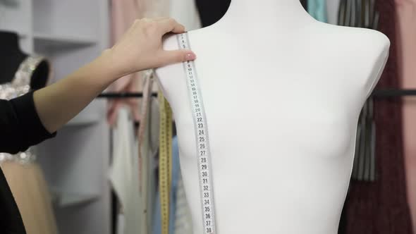 Seamstress Teacher Talks To Her Student Clothing Design Scheme alt