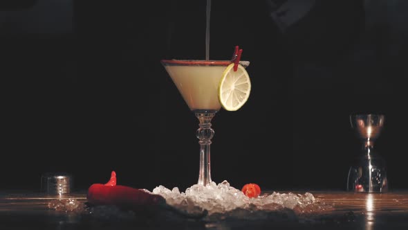 Bartender Make a Cocktail at Bar