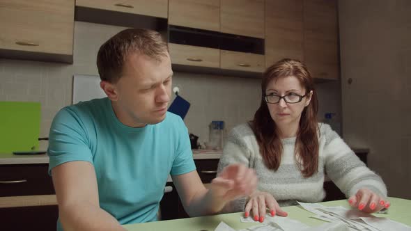 Man Condemns Wife About the Purchases Made is Surprised at the Expenses Looks Through the Purchases alt