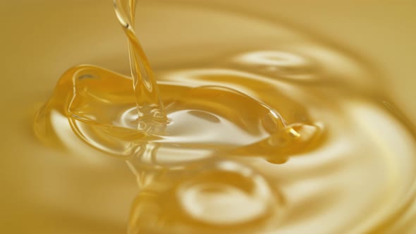 Pouring olive oil. Slow Motion. alt