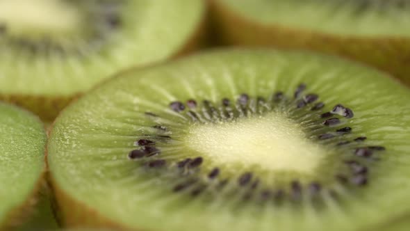 Kiwi Slices Closeup, Macro Food Summer Background, Fruits Top View. Rotate alt