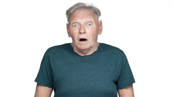 Portrait of Uptight Mature Pensioner 80s Having Gray Hair in Casual Wear Reacting with Open Mouth on alt