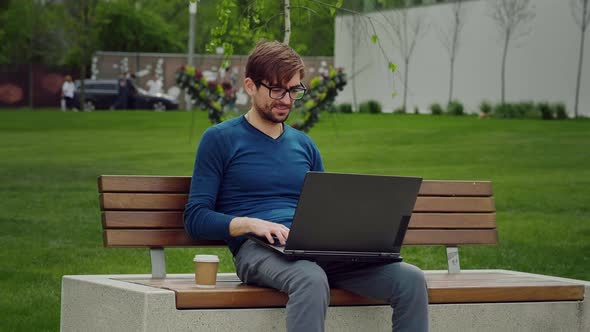 Successful busy african young man afro guy student male freelancer alt