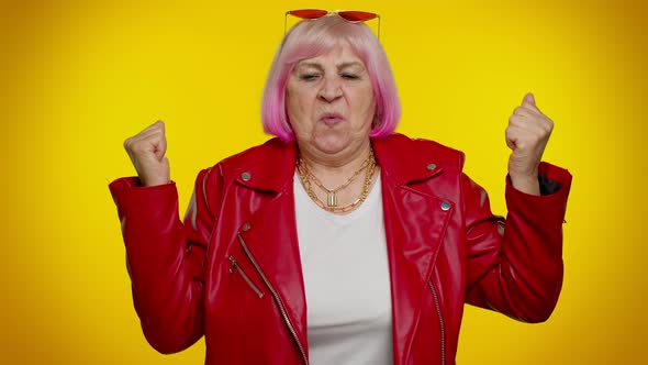 Senior Old Granny Woman Showing Biceps Looking Confident Feeling Power Strength to Fight for Rights alt