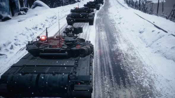 Military Army Tanks On A Winter Road