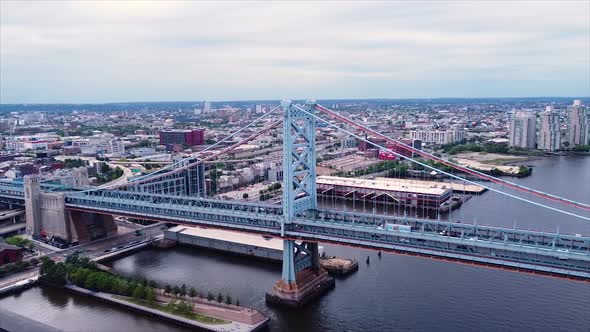 Drone shot of the Ben Franklin Bridge in Philadelphia, Pennsylvania. alt