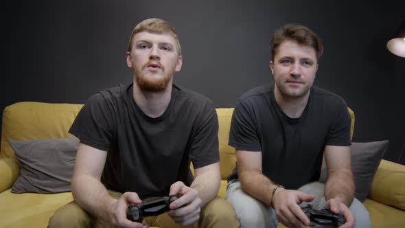 Homosexual Male Couple Plays Xbox