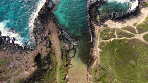 birds eye view of a beautiful secret hawaiian beach alt