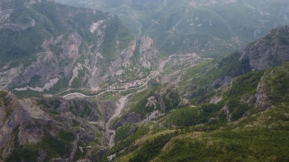 Bird's Eye View of a Small Settlement in a Mountain Valley
