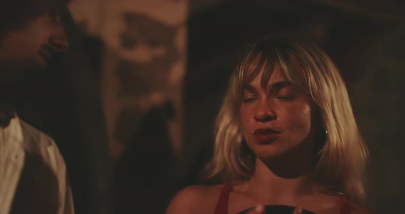 Two friends talk in Wine Cellar alt