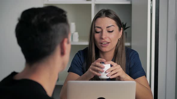 Female Doctor Man Patient Consulting About Corona Virus Pandemic Over Shoulder View alt