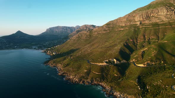 Beautiful panoramic of Chapmans Peak coastline and Hout Bay in Cape Town, aerial alt
