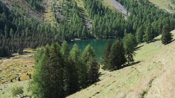 Mountain Valley with Alpine Palpuogna Lake in Albulapass Swiss Alps alt