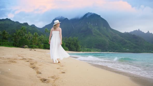 Stylish Traveler in Beautiful White Waving Dress Summer Vacation Hawaii Island alt