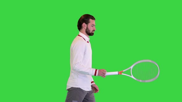 Young Male Tennis Player Walking on a Green Screen Chroma Key