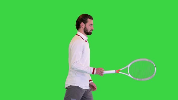 Young Male Tennis Player Walking on a Green Screen Chroma Key alt