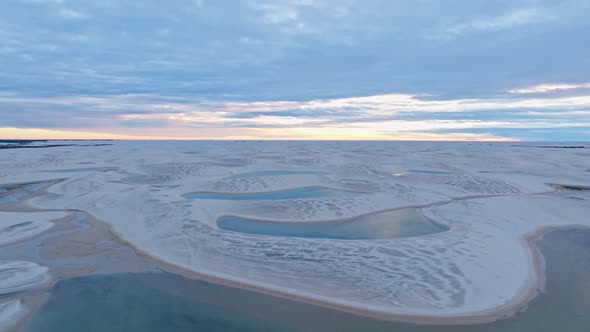 Drone Flies Over A Portion Of Blue Lagoons, Surrounded By White Sand Dunes, In Northeastern Brazil