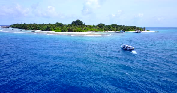 Beautiful aerial copy space shot of a sandy white paradise beach and aqua blue ocean background in 4 alt