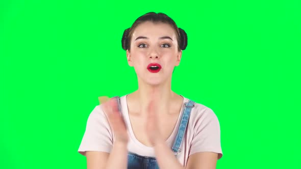 Girl with Two Hair-buns Claps Her Hands with Wow Happy on Green Screen. Slow Motion alt