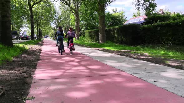 Kids biking on bike path