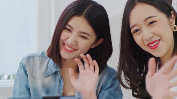 slow motion of successful asin business woman hug each other with happiness and smile with love alt