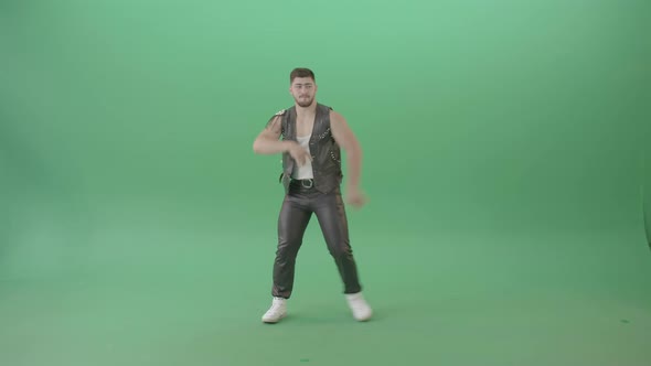 Angry Caucasian Man In Black Leather Costume Dancing Pop Moves On Green Screen   4 K Video Footage alt
