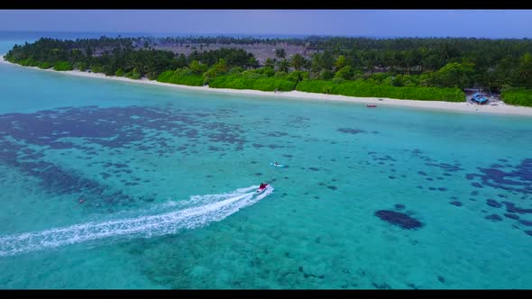 Aerial texture of relaxing coastline beach voyage by aqua blue lagoon and white sandy background of  alt