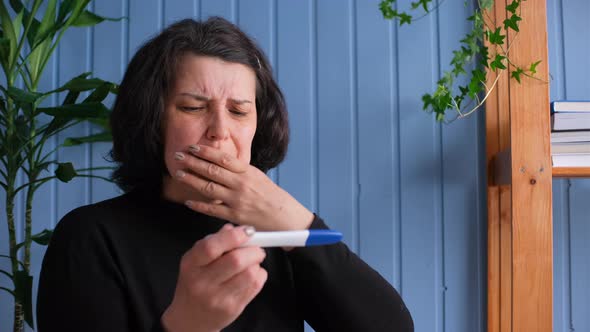 Sad Worried Woman Holds Negative Pregnancy Test