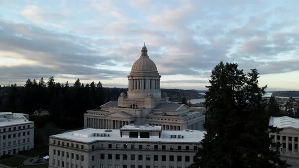 Rising up revealing the Washington State Capitol Dome and the Puget Sound panorama, aerial alt