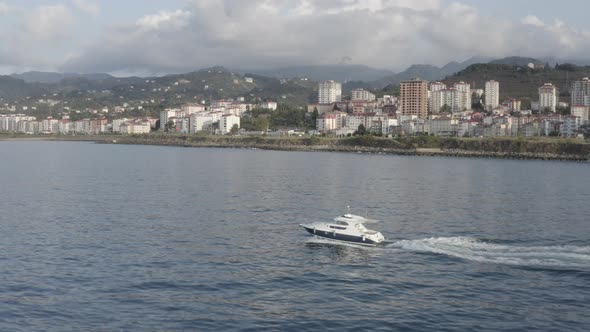 Trabzon City Mountains Sea And Following Speed Boat Aerial View