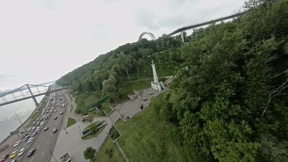 FPV Flight Over the Monument to the Magdeburg Rights Stairs and a Glass Bridge in Kiev