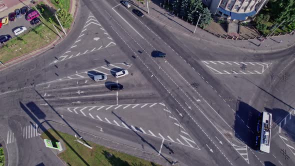 Drone Aerial View of Crossroad in Modern City in Rush Hour alt