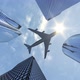 Airplane Flying Over 4 Skyscrapers - VideoHive Item for Sale