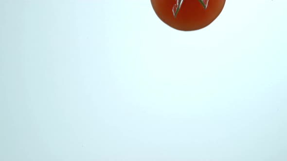 Tomato splashing into water in slow motion; shot on Phantom Flex 4K at 1000 fps alt