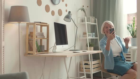 Senior Woman Working at Home alt