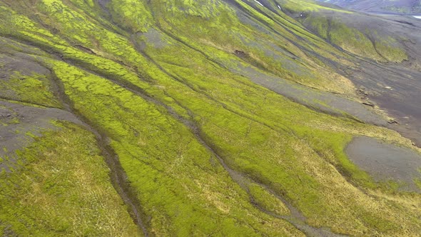 Aerial View of a Volcanic Plateau, Lava Flow, Green Moss in Iceland alt