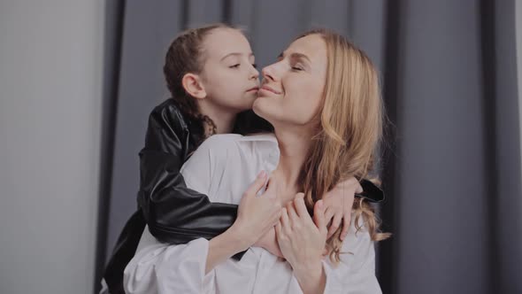 Mother and Daughter Embracing alt