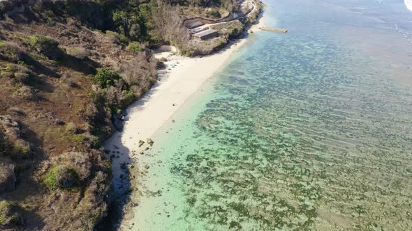 Drone Over Sandy Beach And Coastline alt