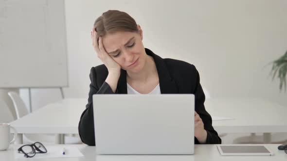 Upset Young Businesswoman Reacting to Failure of Project alt