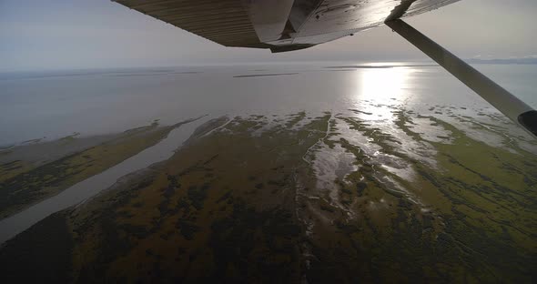 Alaska Helicopter Tour - Sunset Flight Around The Lake Landscape With Melting Ice Glaciers - Aerial alt