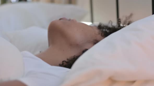 Close Up Pf Peaceful African Woman Sleeping in Bed  alt