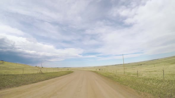 POV point of view - Driving through countryside in Eastern Colorado. alt