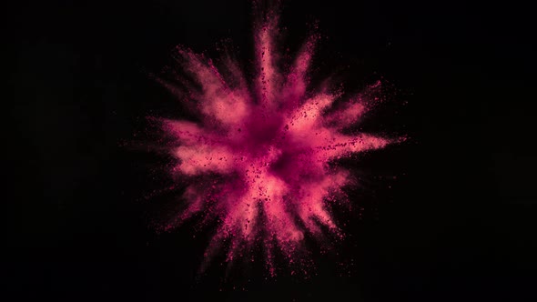 Pink Powder Explosion in Super Slow Motion Isolated on Black Background alt
