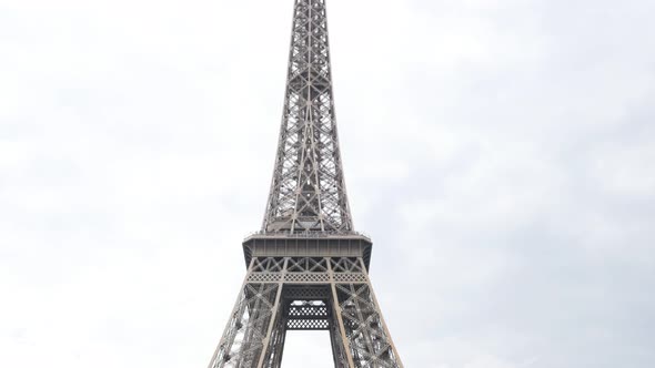 The Eiffel tower most famous symbol of france and Paris slow tilt 4K 2160p 30fps UltraHD footage - F alt
