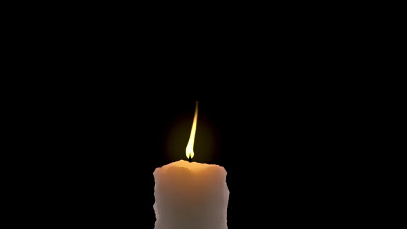 Candle Flame On A Black Background