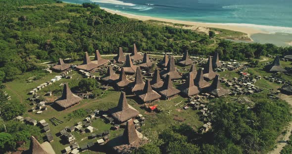 Tropical Rural Designed Roof Houses Village at Sea Bay Aerial View