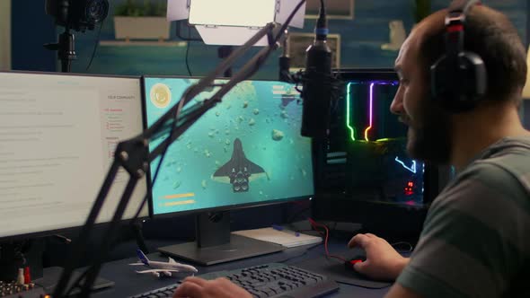 Pro Streamer Man Playing Space Shooter Video Games alt