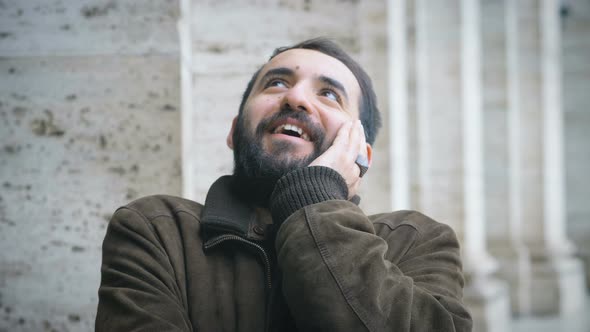 Confident attractive young man looking alt